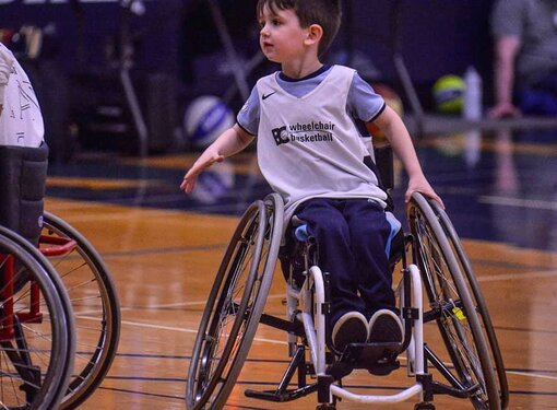 brody playing wheelchair basketball