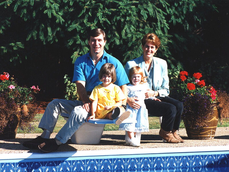 Rick Hansen and Amanda Hansen with his two daughters