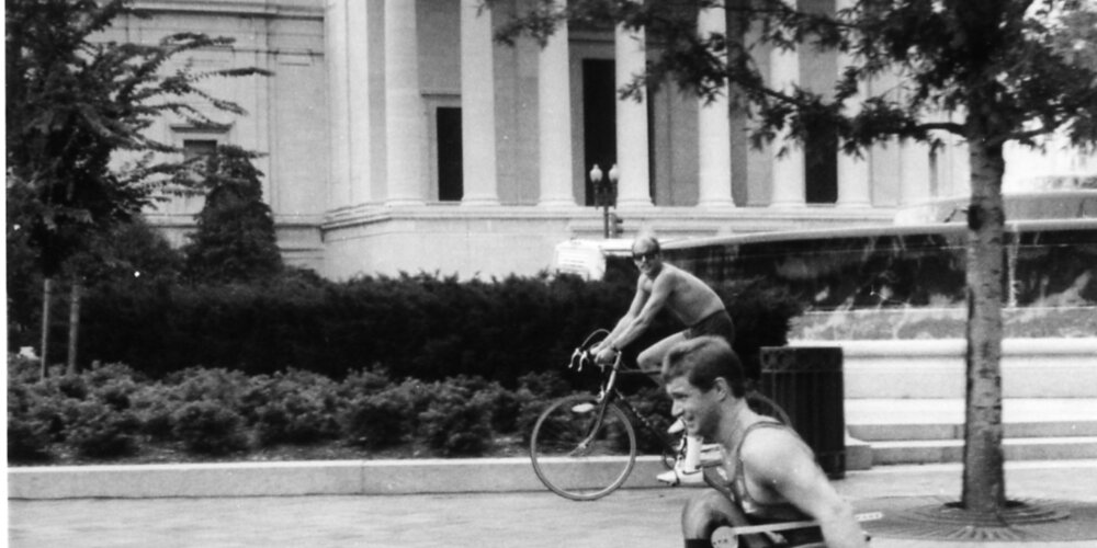 Rick wheeling past the White House in Washington, D.C. in 1986