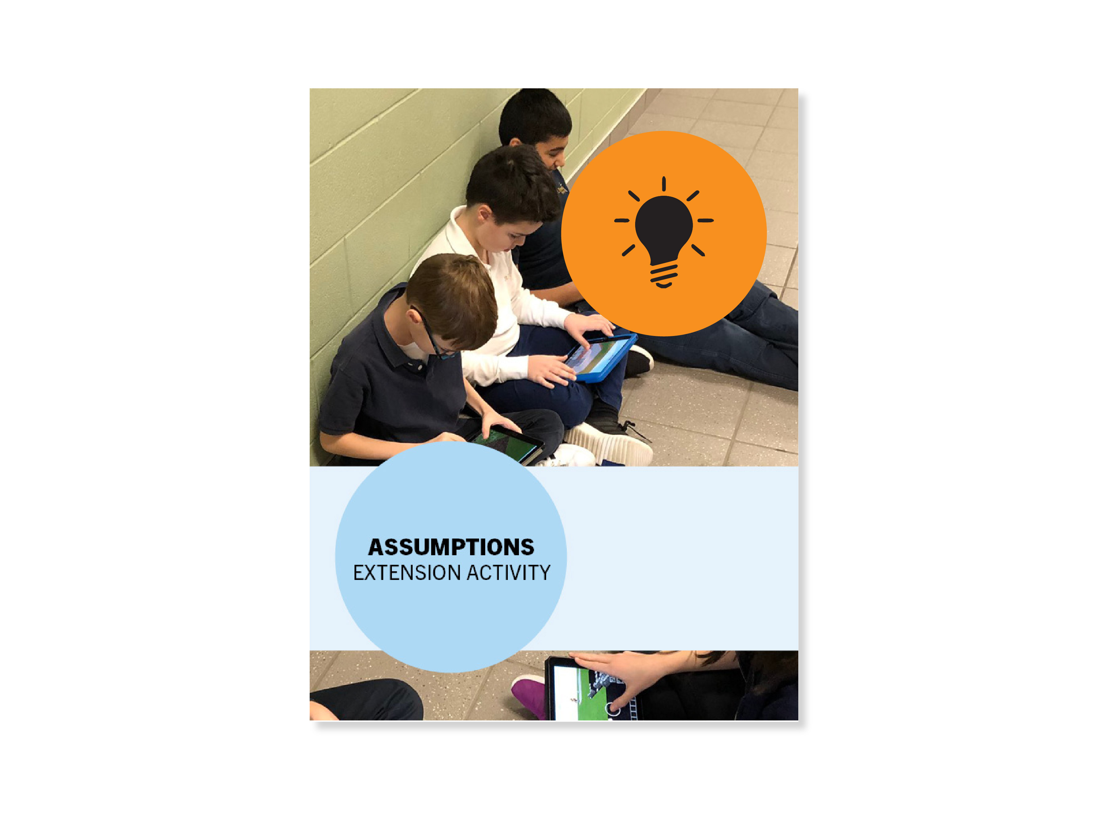 Assumptions Extension Activity, group of young students with heads bent over work, sitting in a school hallway