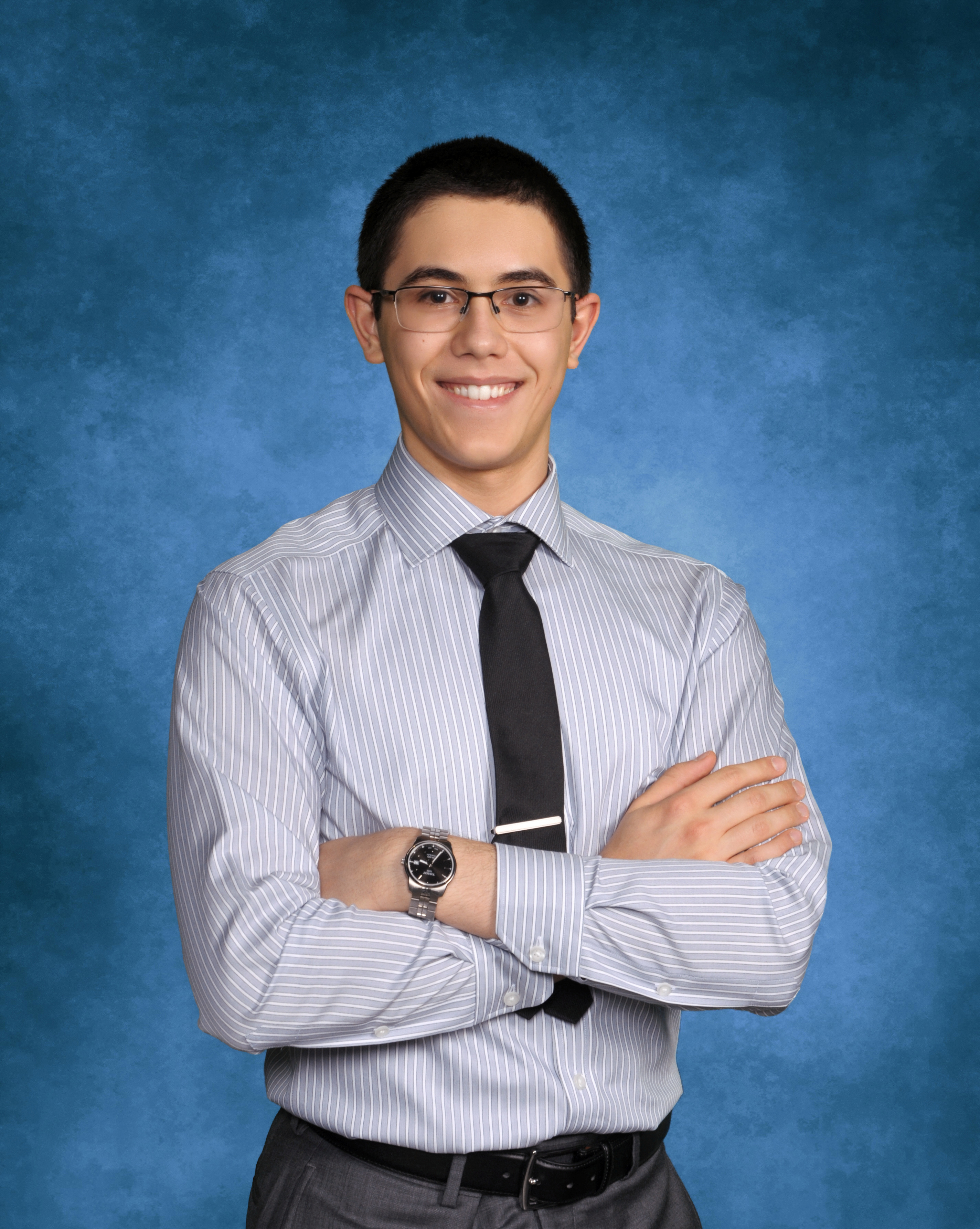 Young man with crossed arms