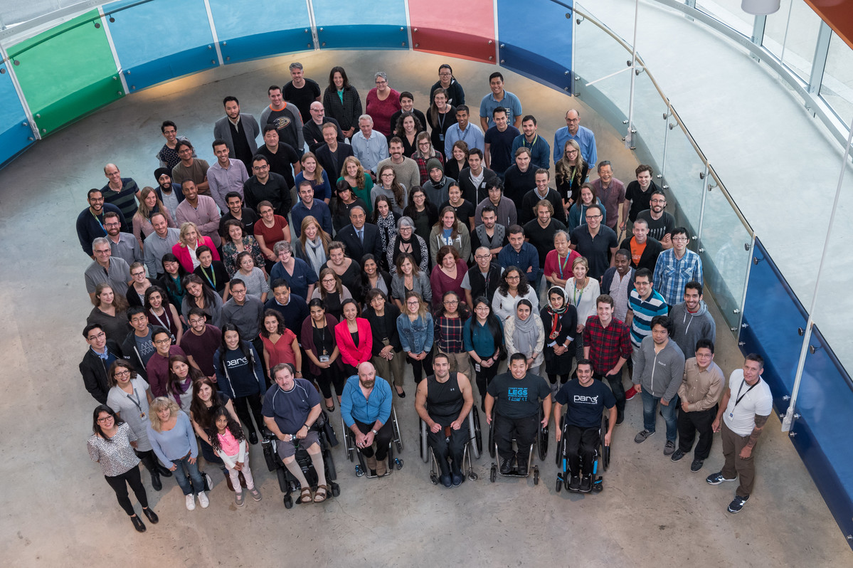 Photo of the team at the Blusson Spinal Cord Centre in the atrium of the building 