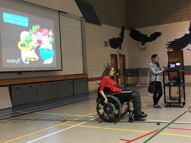 Natasha speaks in indigenous community