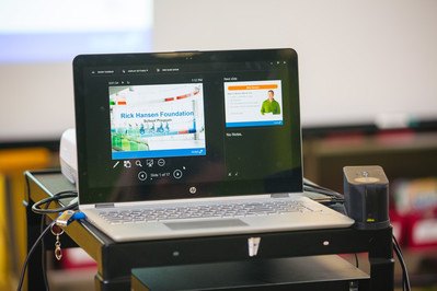 Assistive reading device showing accessible PowerPoint usage