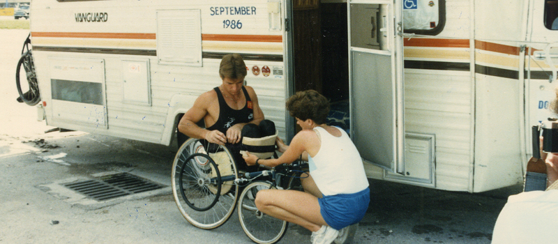 Amanda Hansen and Rick training next to the van during the man in motion world tour