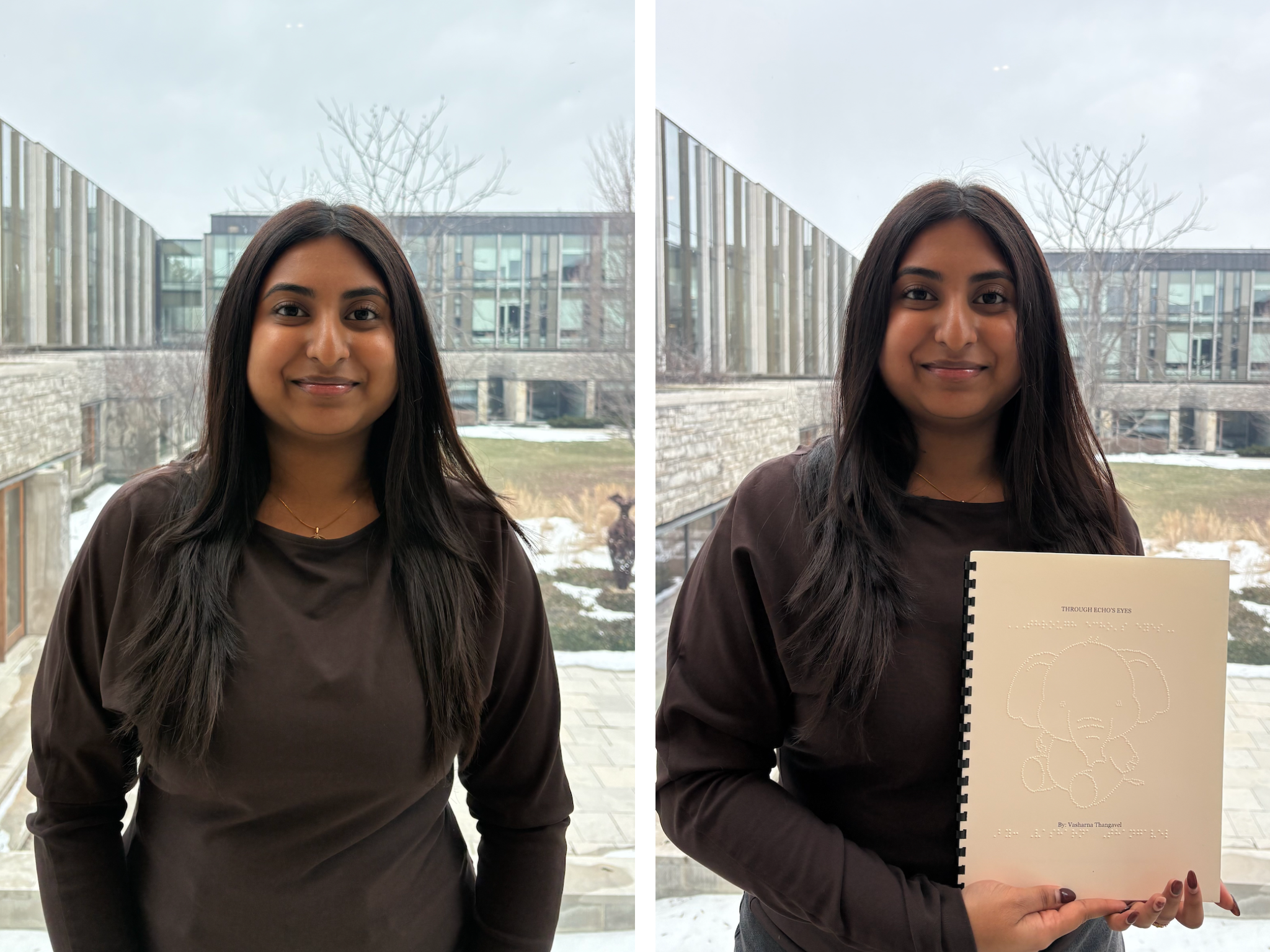 A woman stands indoors holding a spiral‑bound tactile book with raised illustrations, with campus buildings visible outside the window