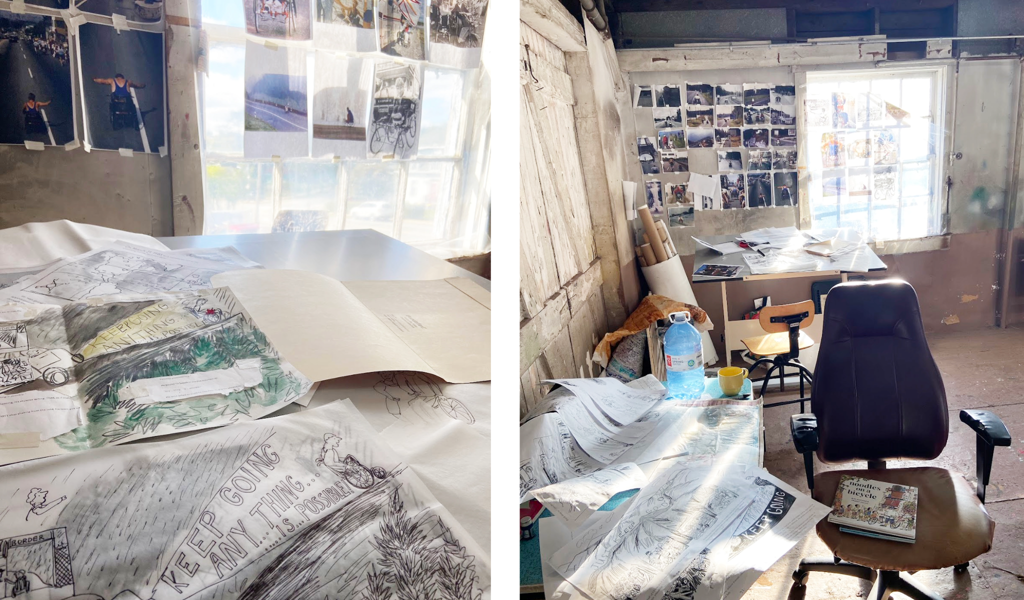 Wide view of a rustic studio workspace with a desk covered in drawings, a chair, and walls filled with pinned reference photos and artwork beside a bright window.