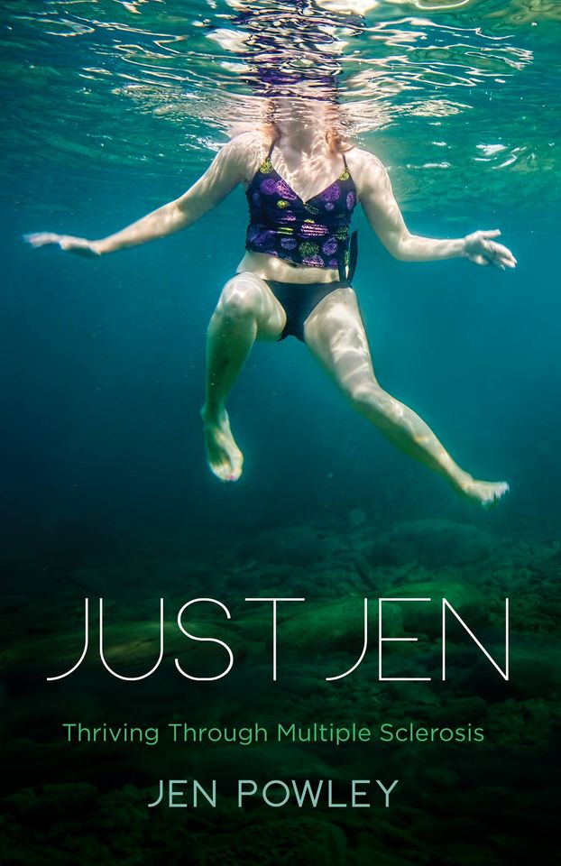 Book cover photograph of woman floating underwater in ocean.