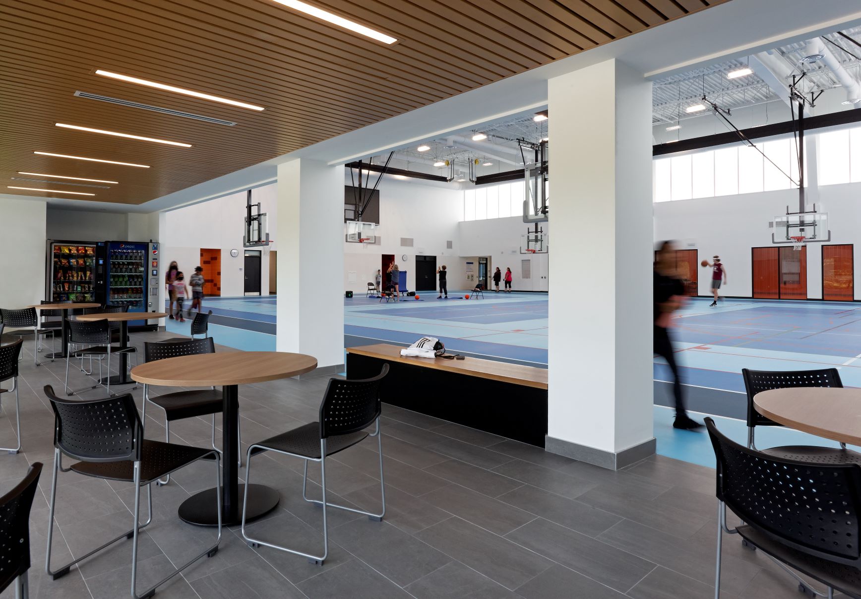 Inside Kingston East Community Centre showing an accessible gymnasium and a viewing area.