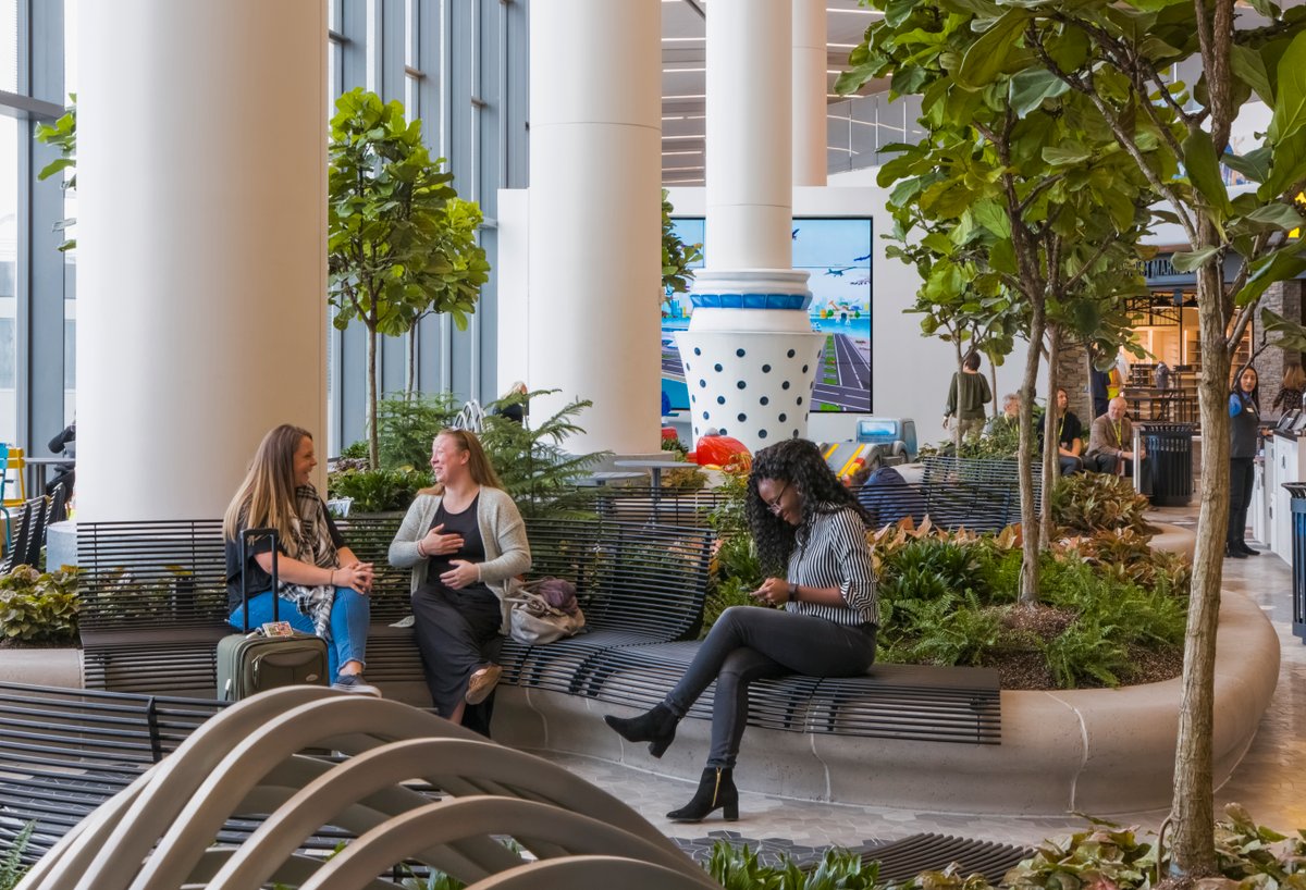 Park bench style attractive seating area at LaGuardia airport.