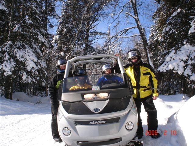 Group using adaptive winter sports equipment