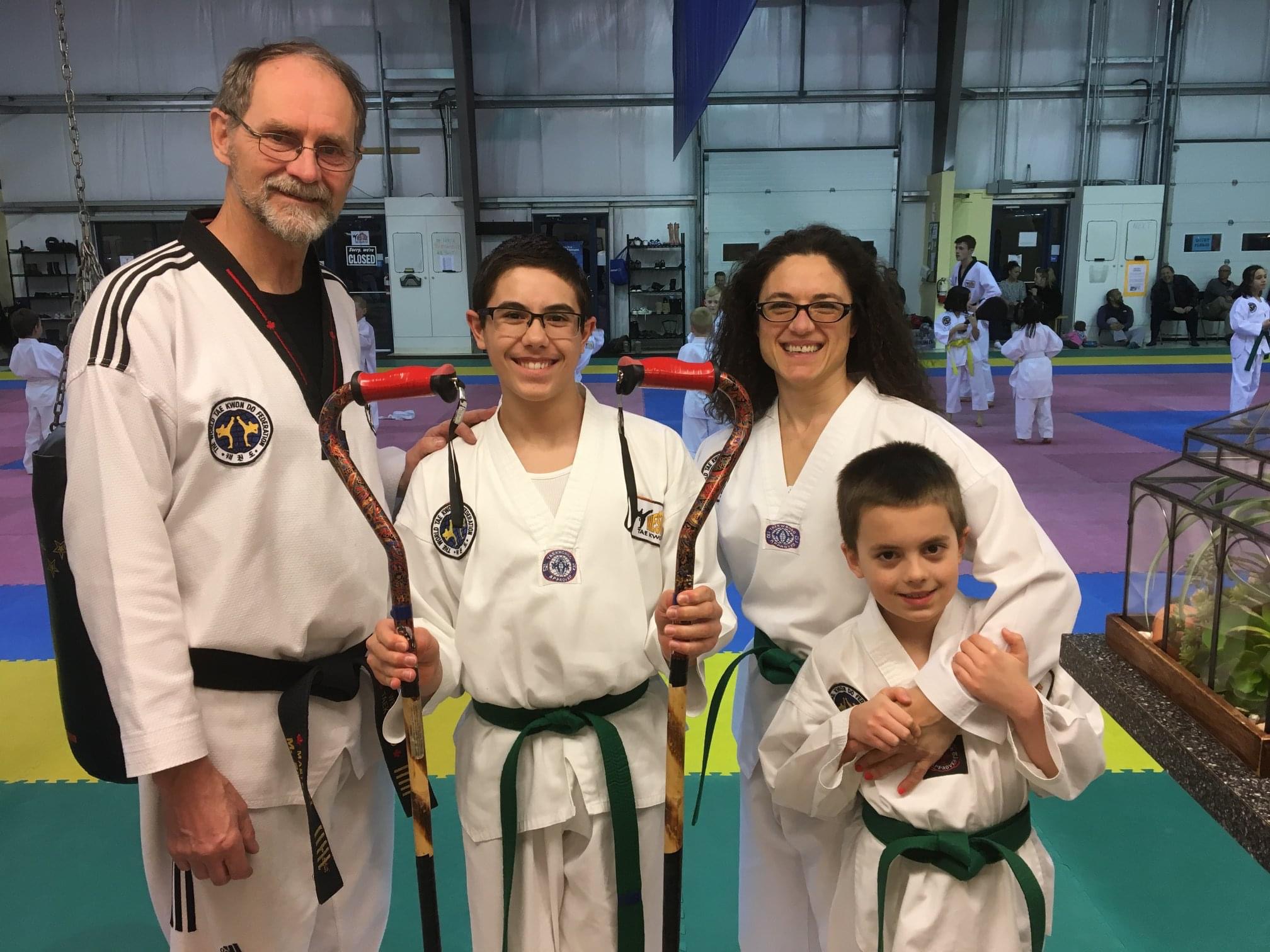 Micheal and his students at Ju Jitsu, wearing white robes