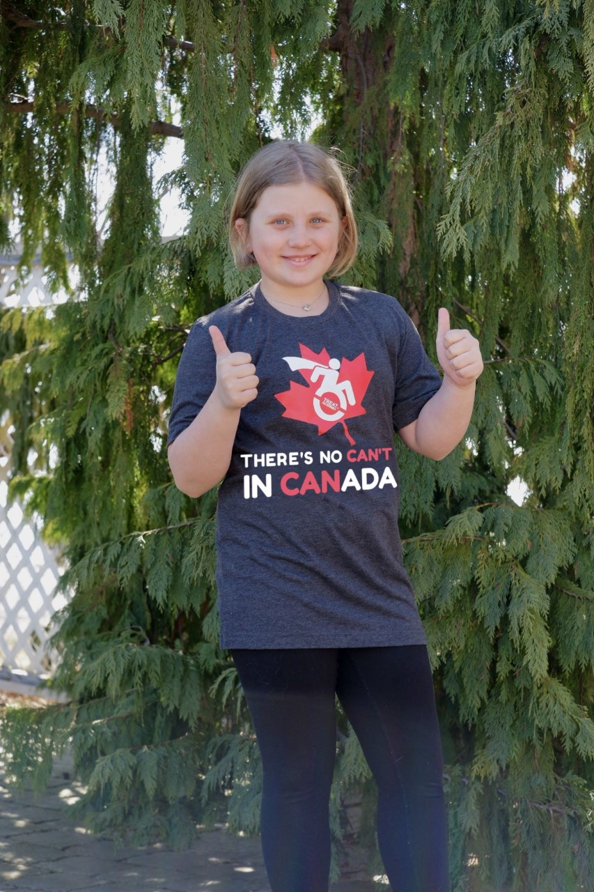 Siena wearing t-shirt that says There's no Can't in Canada