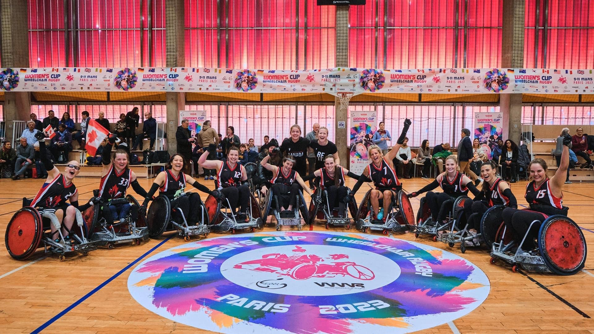 The women's world cup wheelchair rugby team celebrating at the competition in Paris. 