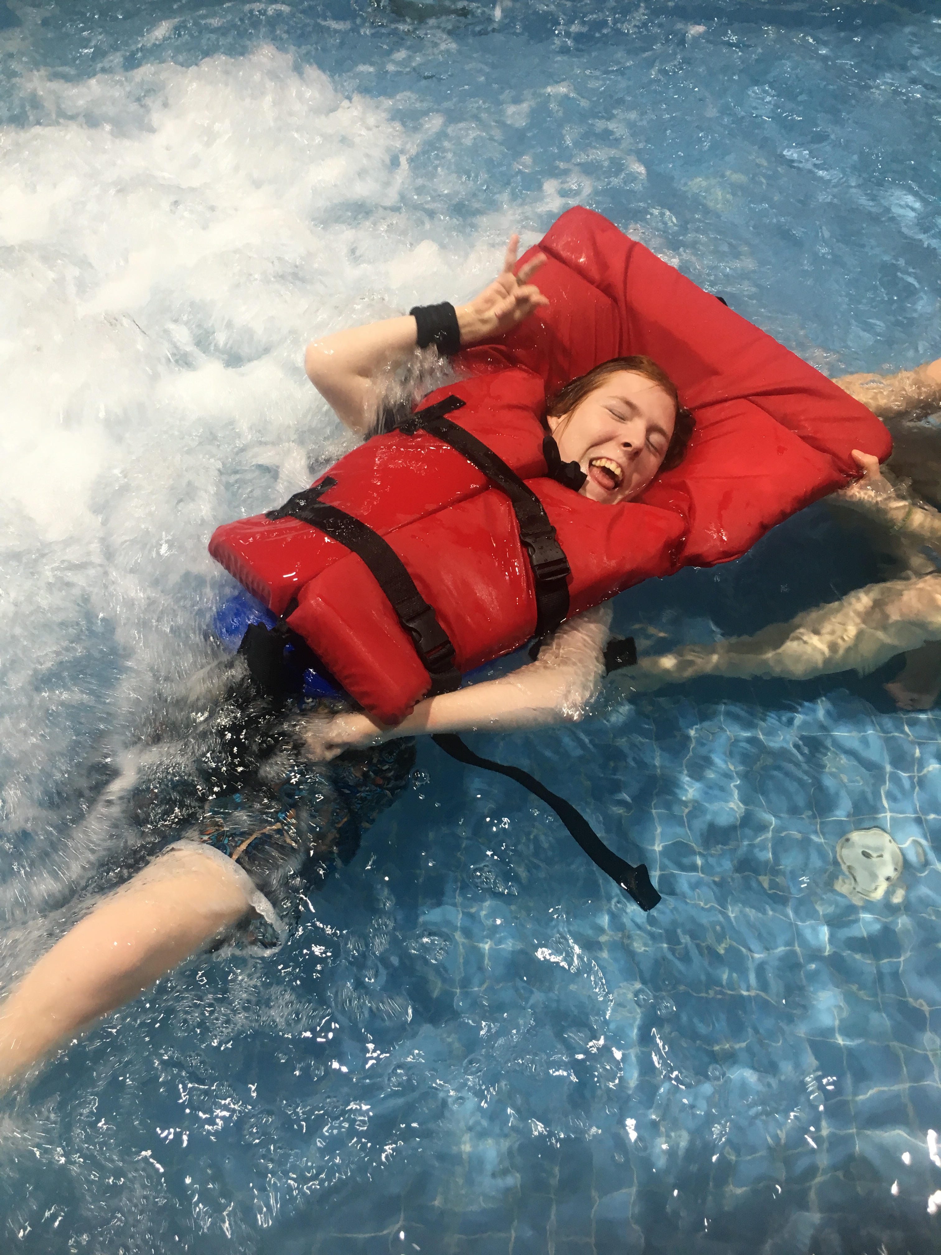 Evan in pool smiling