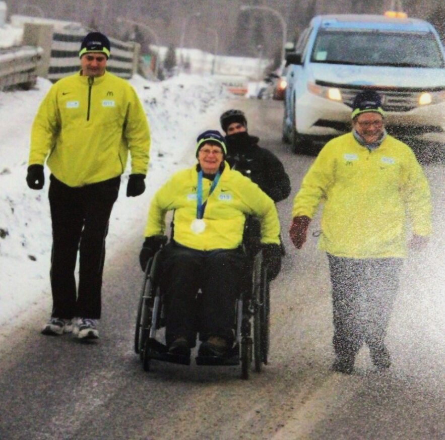 Cindy wheels through snow during the relay