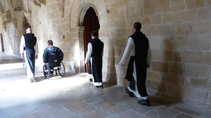 Rick and monks in Poblet Monastery.