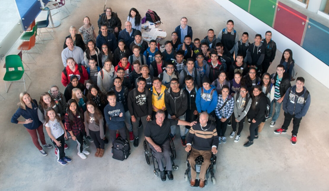 Photo taken from above of Rick Hansen Secondary School students as they explore disability during interactive visit to Blusson Spinal Cord Centre
