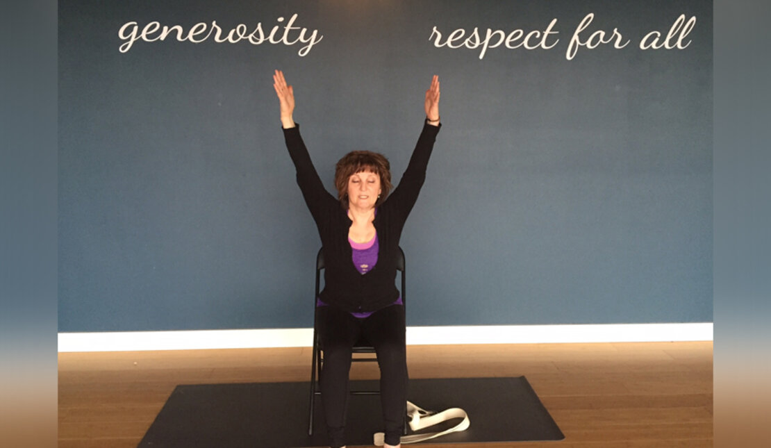 A woman does yoga indoors