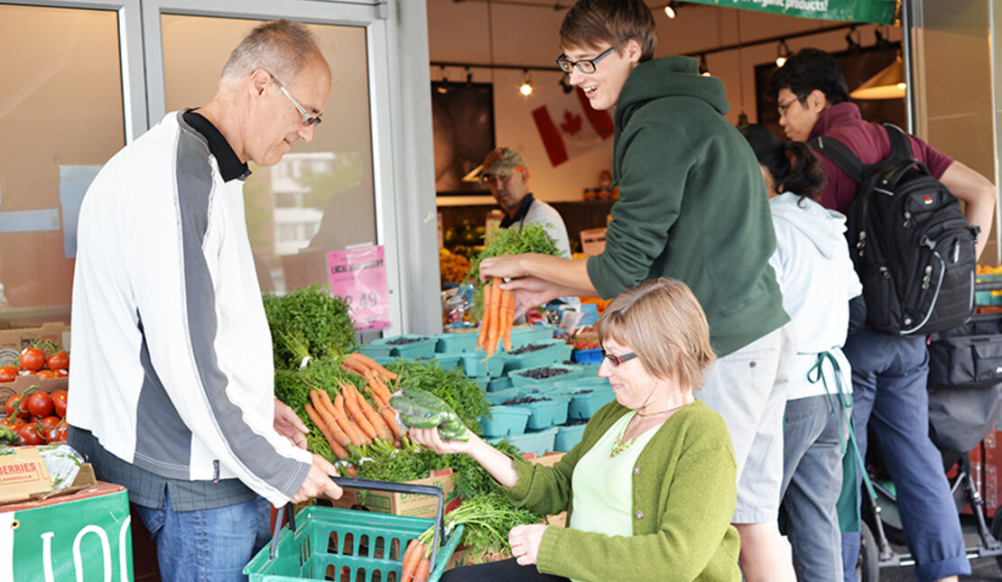 Family shopping at a market