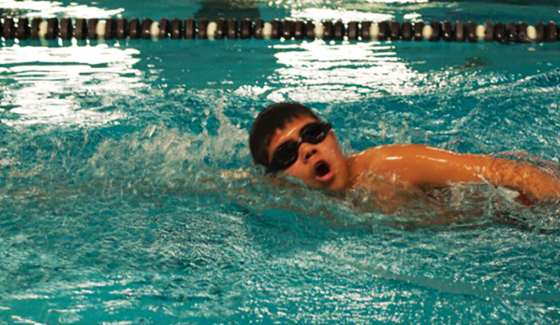 RHF Ambassador, Michael Saunders swims in pool