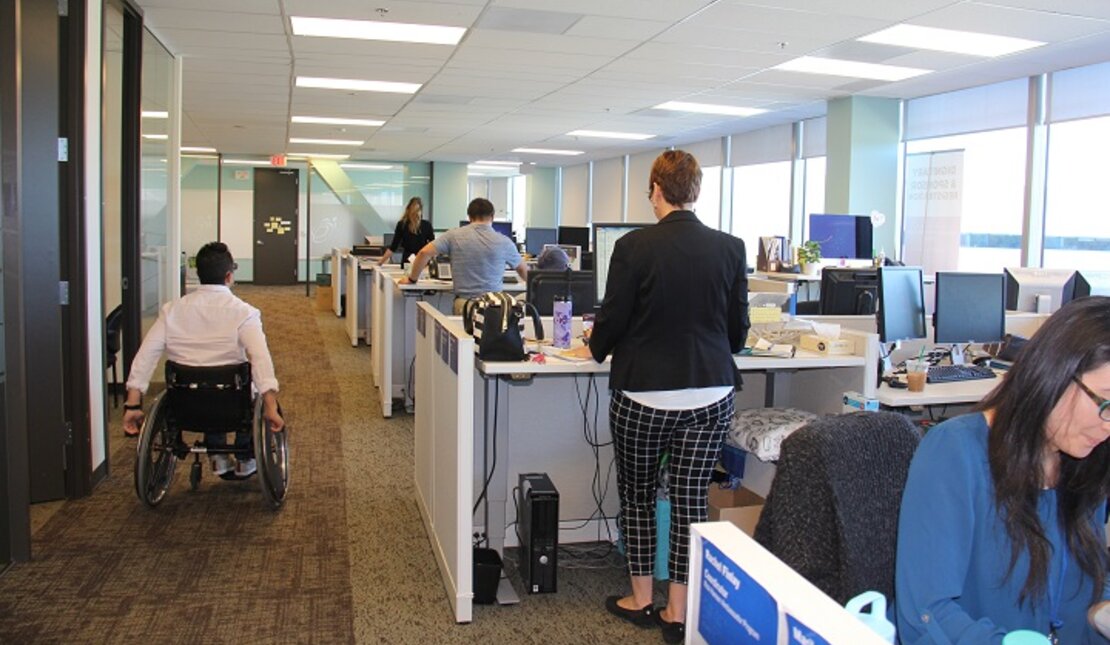 Rick Hansen Foundation staff working in an accessible office