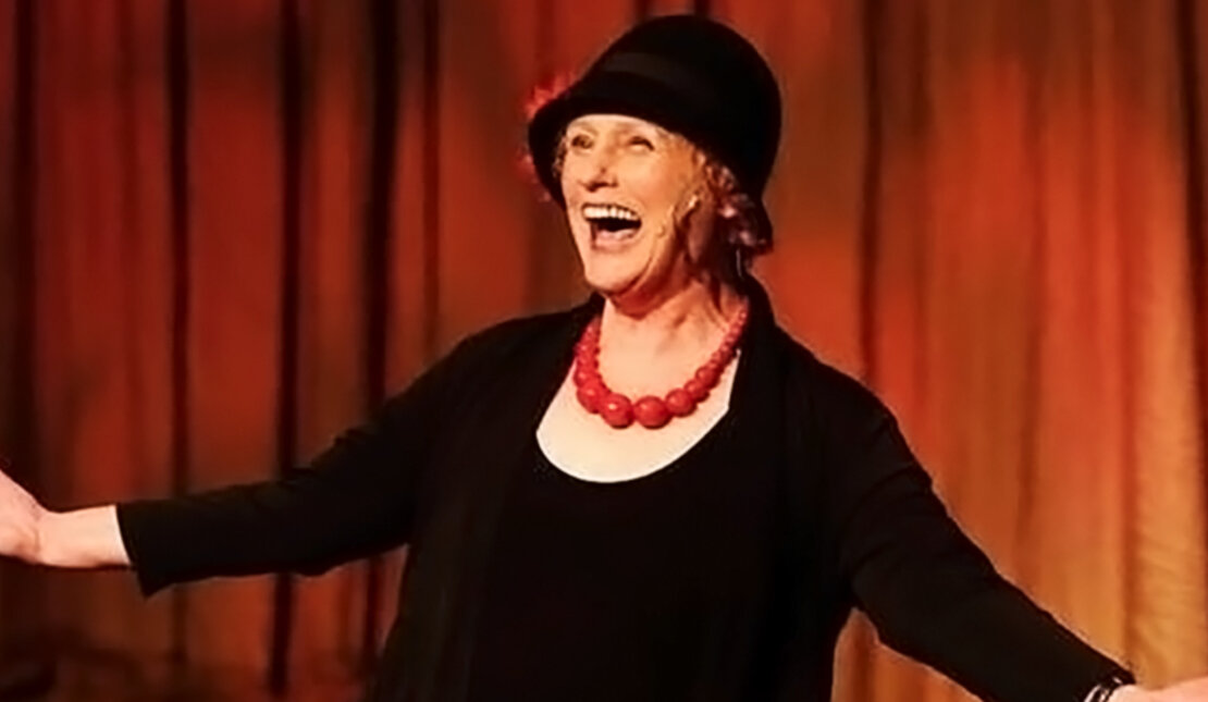 Cathy Browne on stage performing