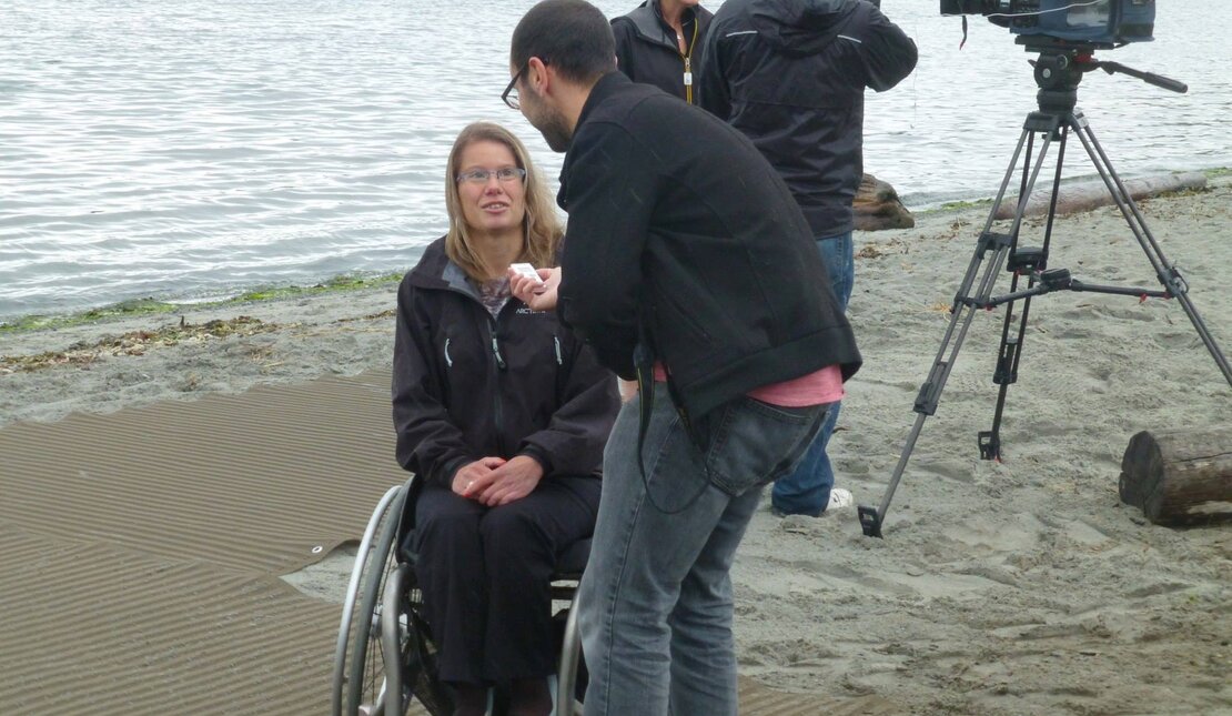 RHF Ambassador,  Stef Barber being interviewed at the beach