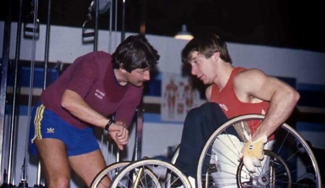 Tim trains Rick Hansen for Man in Motion World Tour