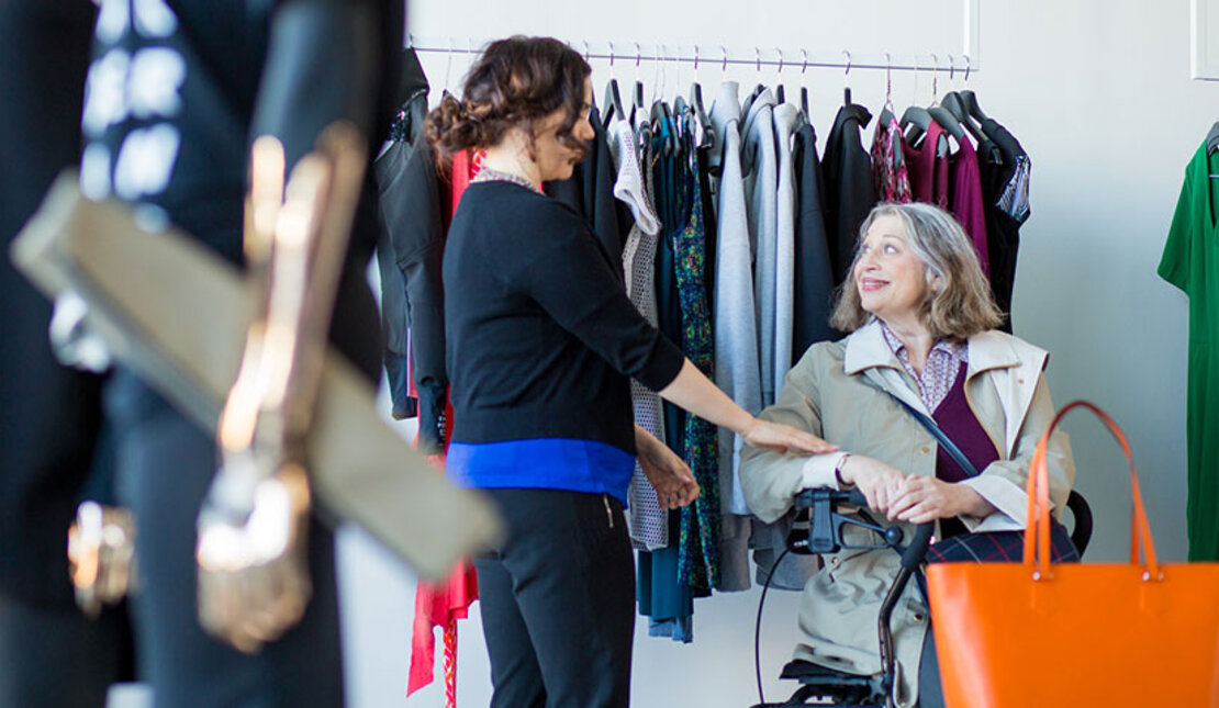 Woman in an accessible clothing store