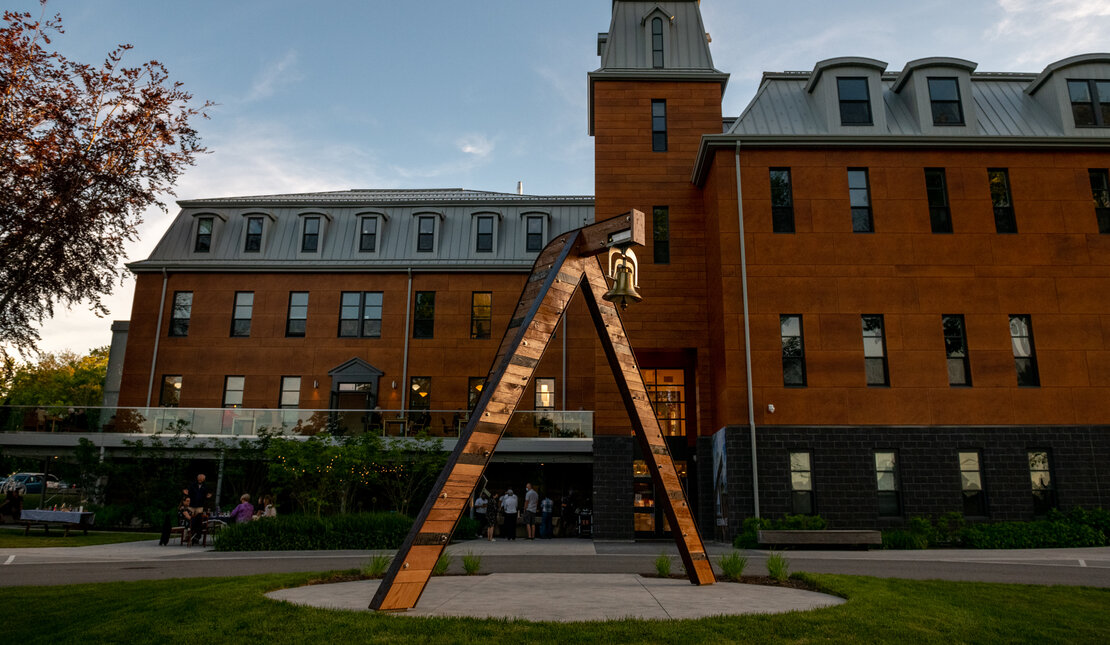  Resonance by Ursula Johnson at Eltuek Arts Centre. An inverted V-shaped art piece with a bell on the top. It is located outside of the Arts Centre. 