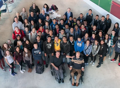 Photo taken from above of Rick Hansen Secondary School students as they explore disability during interactive visit to Blusson Spinal Cord Centre