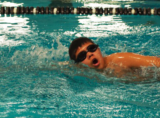 RHF Ambassador, Michael Saunders swims in pool