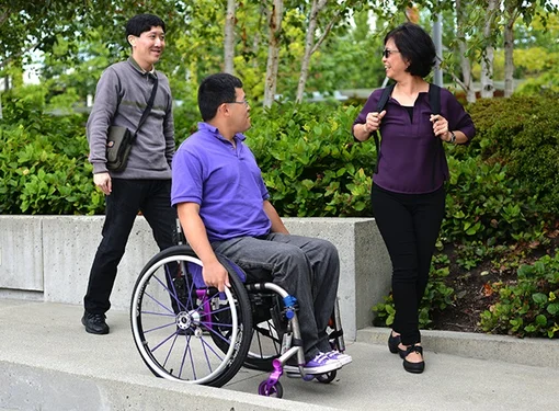 Group of friends talk together outside