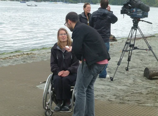 RHF Ambassador,  Stef Barber being interviewed at the beach
