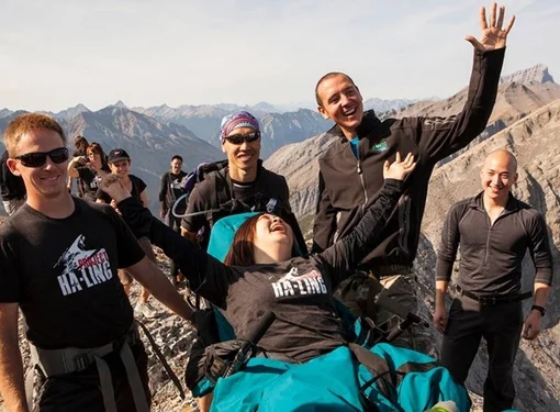 RHF Ambassador, Kuen Tang on a mountain peak