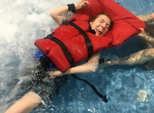 Eva swimming in pool