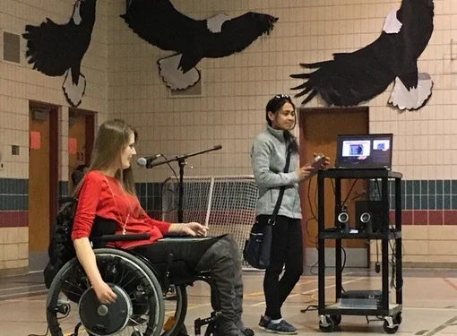 Natasha Urkow makes a speech in front of everyone.