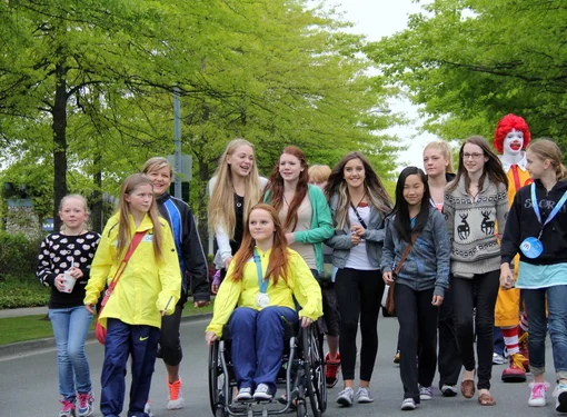 Group of girls, one wheelchair user