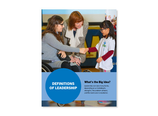 A female Rick Hansen Foundation Ambassador that uses a wheelchair congratulating and shaking hands with a young girl at a school assembly. A teacher is also hunching over to speak to the girl. Cover for "Definitions of Leadership" lesson.