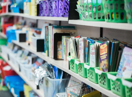books on a shelf in a classroom