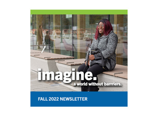 Person with pink hair holding a white cane sitting on a bench and smiling. White writing reads "imagine. A world without barriers. Fall 2022 newsletter.