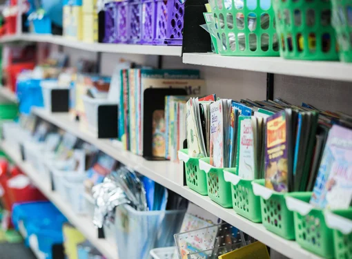 Row of books in bins.