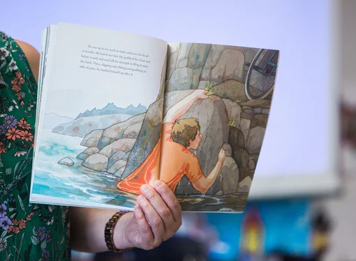 An open page of a colourful illustrated children's book.