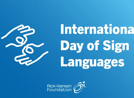 Blue graphic featuring a white illustration of two hands signing and the text “International Day of Sign Languages.” The Rick Hansen Foundation logo appears at the bottom.