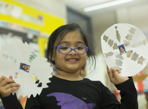 Elementary students participate in Abilities in motion school program snowflake activity