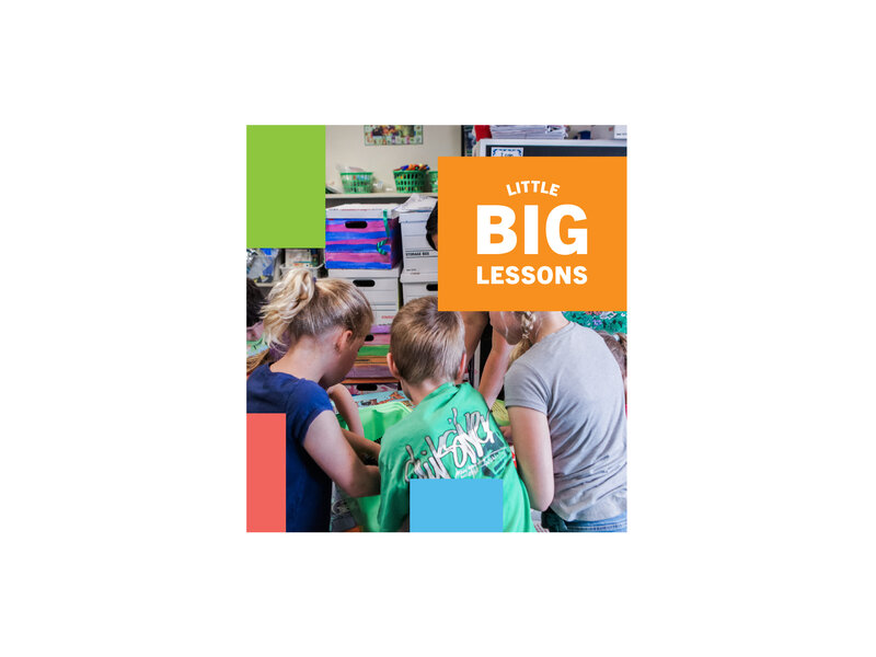 A small group of elementary students sitting at a table with their backs turned, working together on a group activity. Little Big Lessons logo text.