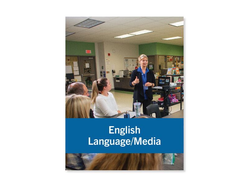 Image of a woman standing and presenting to a group of seated educators. Cover image for "English Language/Media literacy Ready-made Challenges and Projects".