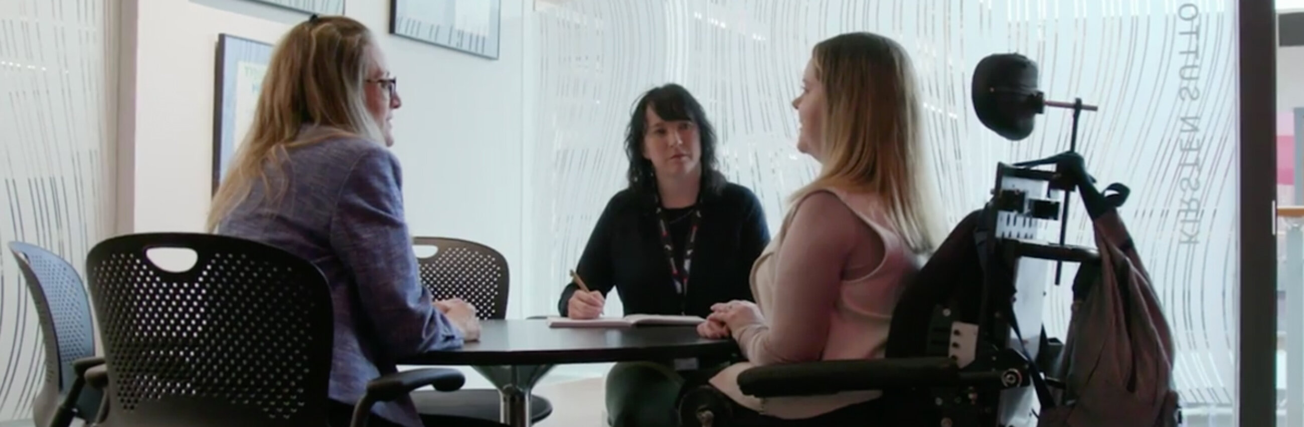 three woman at a table 