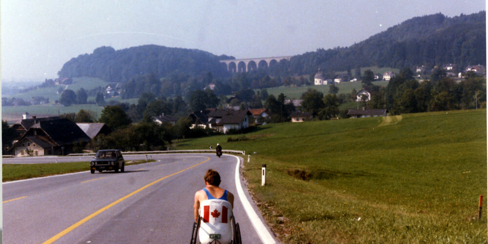 Rick Hansen wheeling through the countryside of Austria during late September of 1985. 